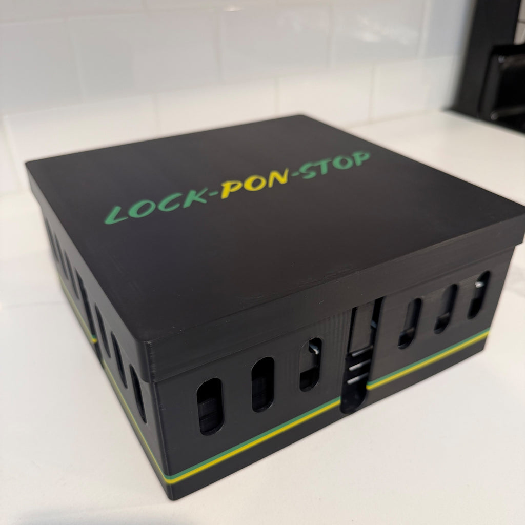Closed storage case for the Lock Pon Stop 16×16 modular magnetic Ludi board, designed to securely store the board, game pieces, and dice.