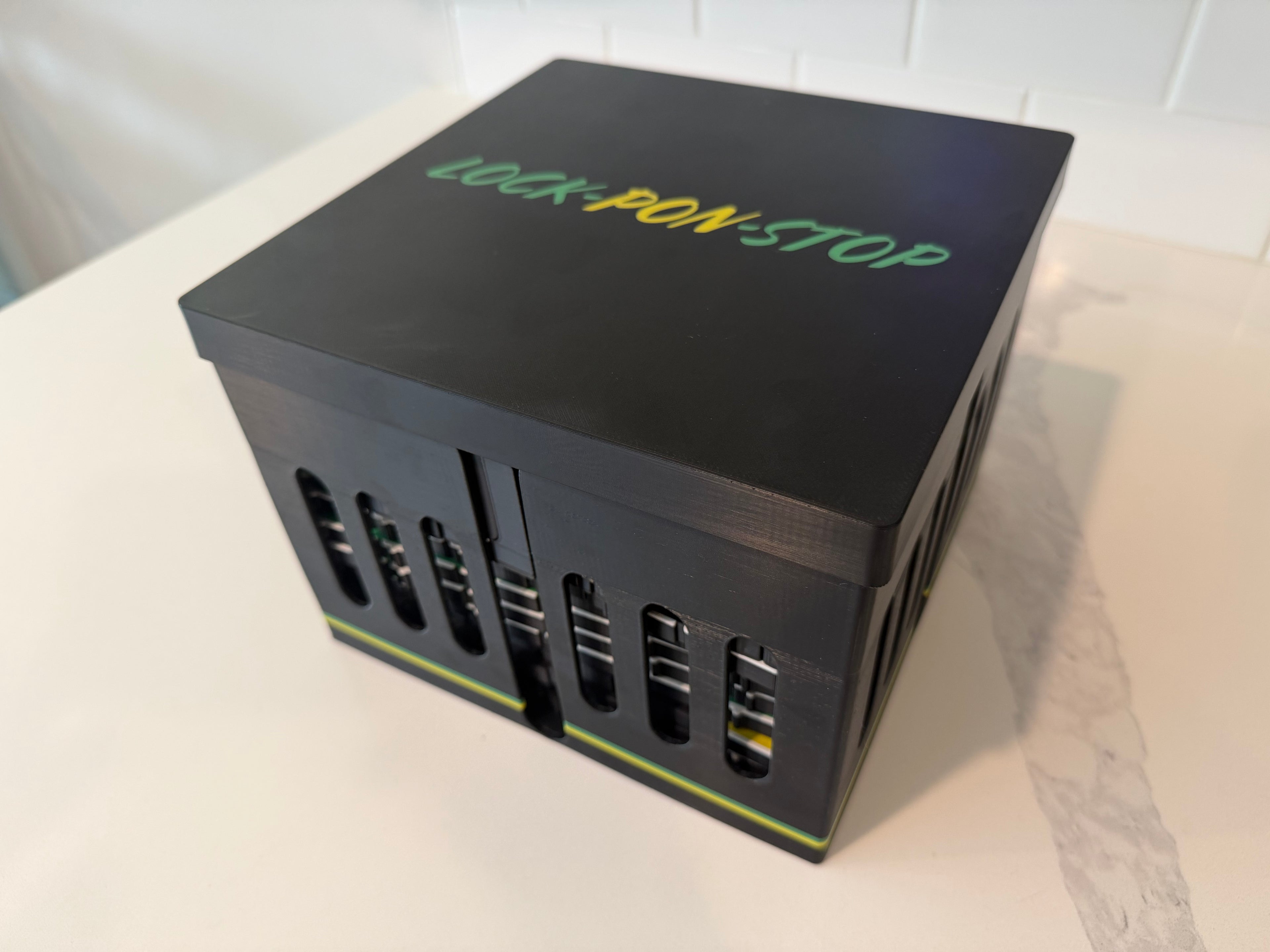 Closed Lock Pon Stop storage case for the 24x24 Modular Magnetic Ludi Board, securely holding all modular board sections, magnetic game pieces, and accessories in a durable, travel-ready ASA case.