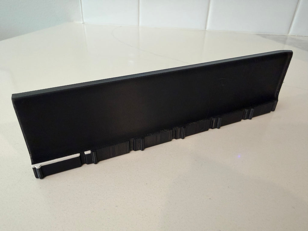 Rear view of a side wall panel for the Lock Pon Stop 24x24 Modular Magnetic Ludi Board, showcasing the raised border, precision snap-together connectors, and durable ASA construction that helps keep game pieces securely on the board during play.