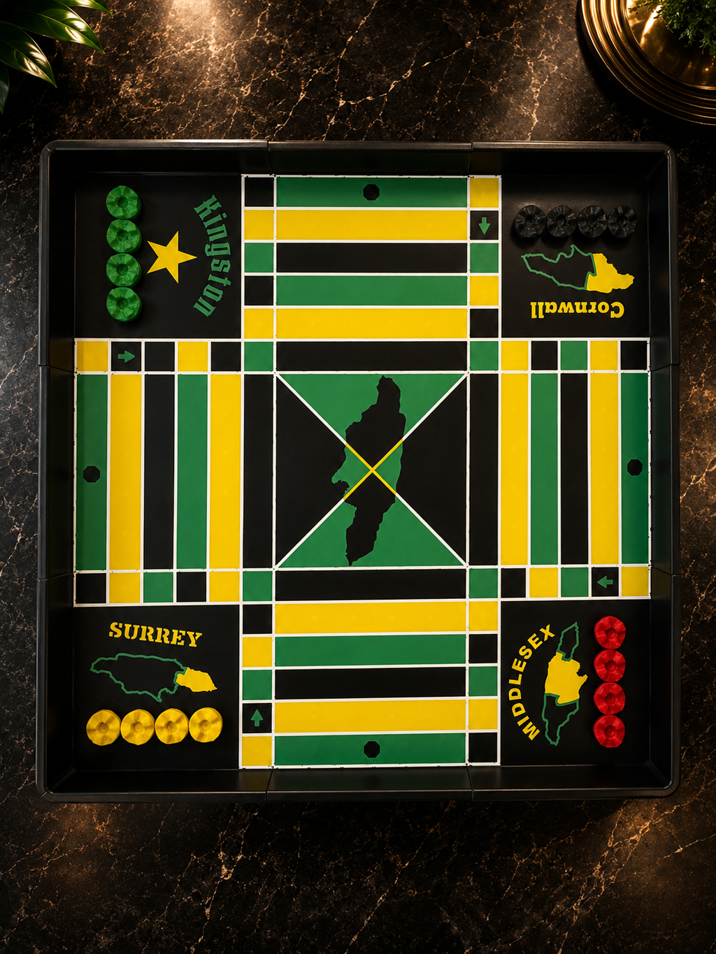 24x24 modular magnetic Jamaican Ludi board with magnetic stackable game pieces on a premium black marble background.