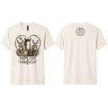 Natural Next Level 6410 sueded t-shirt shown from the front and back. The front features a vintage-style "Farm Life Charmed Life" graphic with rescued donkeys, a horse, heart outline, clover, and wildflowers. The back includes the Strong Farm Sanctuary logo printed below the collar.