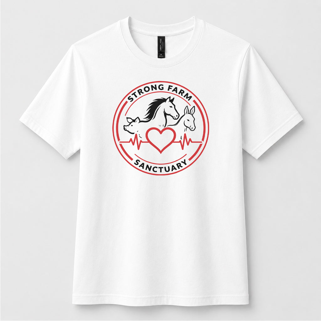 White Next Level 6410 sueded t-shirt featuring the official Strong Farm Sanctuary logo printed on the front chest. The circular logo includes a horse, donkey, pig, heart, and heartbeat line representing the sanctuary's mission to care for rescued farm animals.