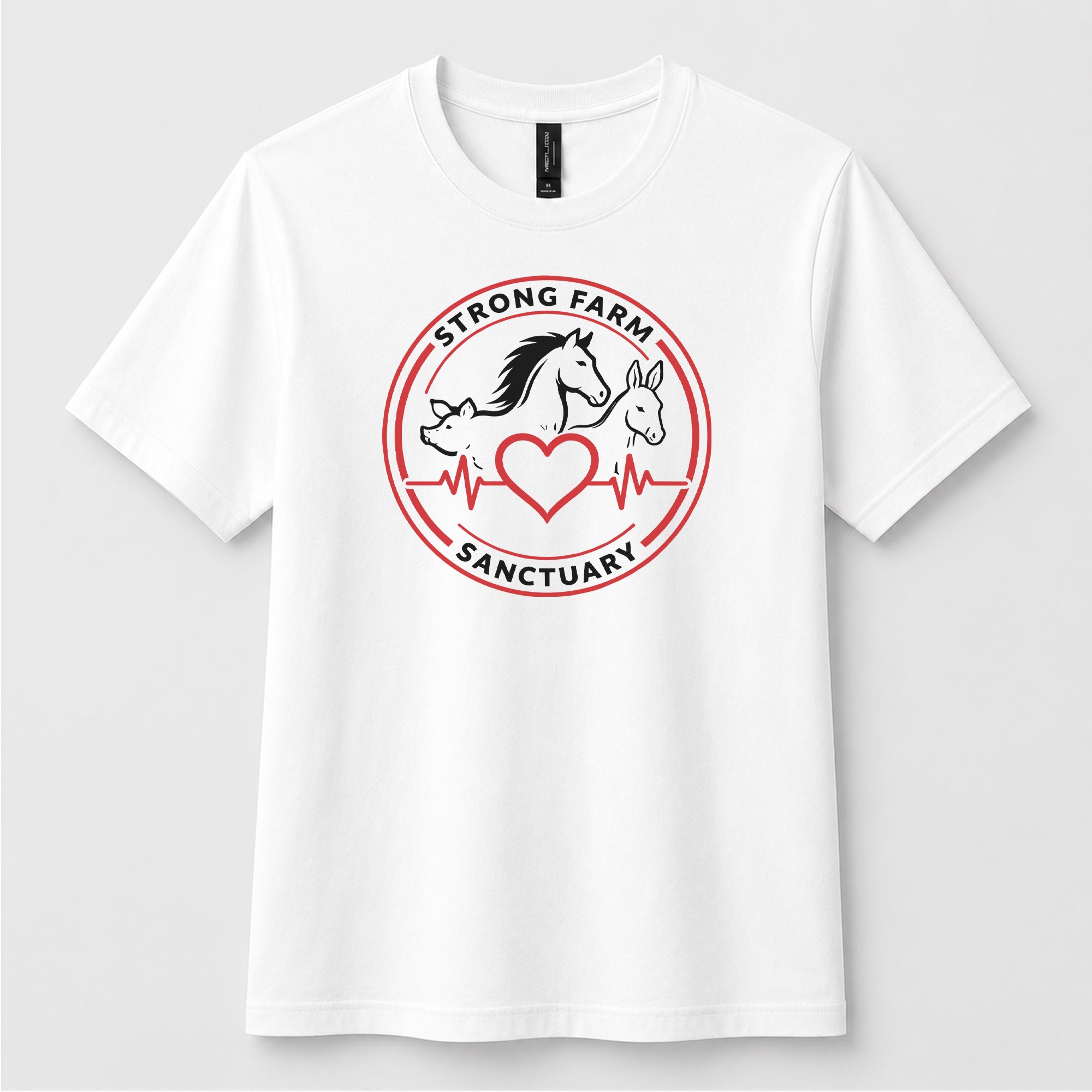 White Next Level 6410 sueded t-shirt featuring the official Strong Farm Sanctuary logo printed on the front chest. The circular logo includes a horse, donkey, pig, heart, and heartbeat line representing the sanctuary's mission to care for rescued farm animals.