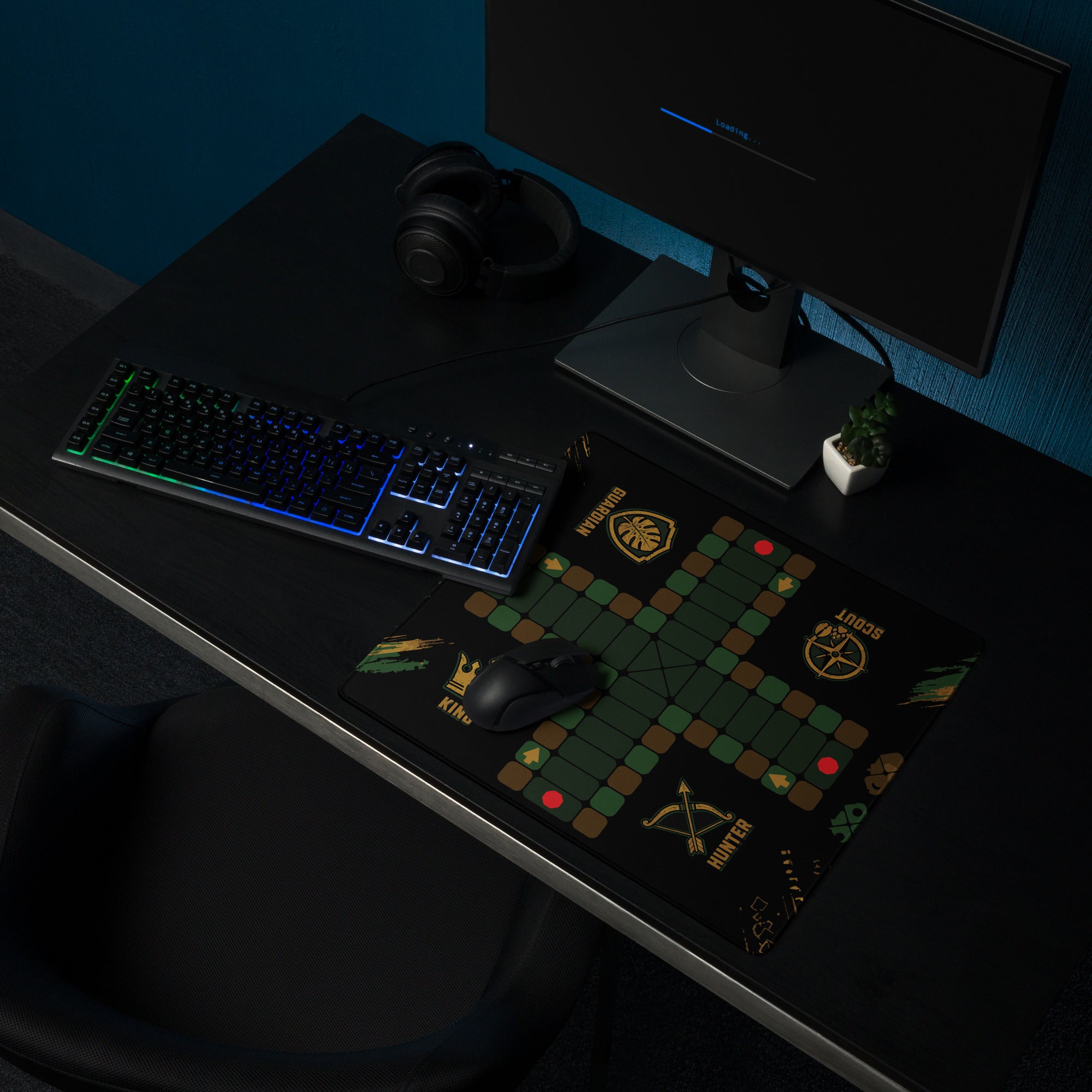 Compact 18 × 16-inch Jungle Roles Jamaican Ludi mouse pad beside a gaming keyboard in a dark computer setup.