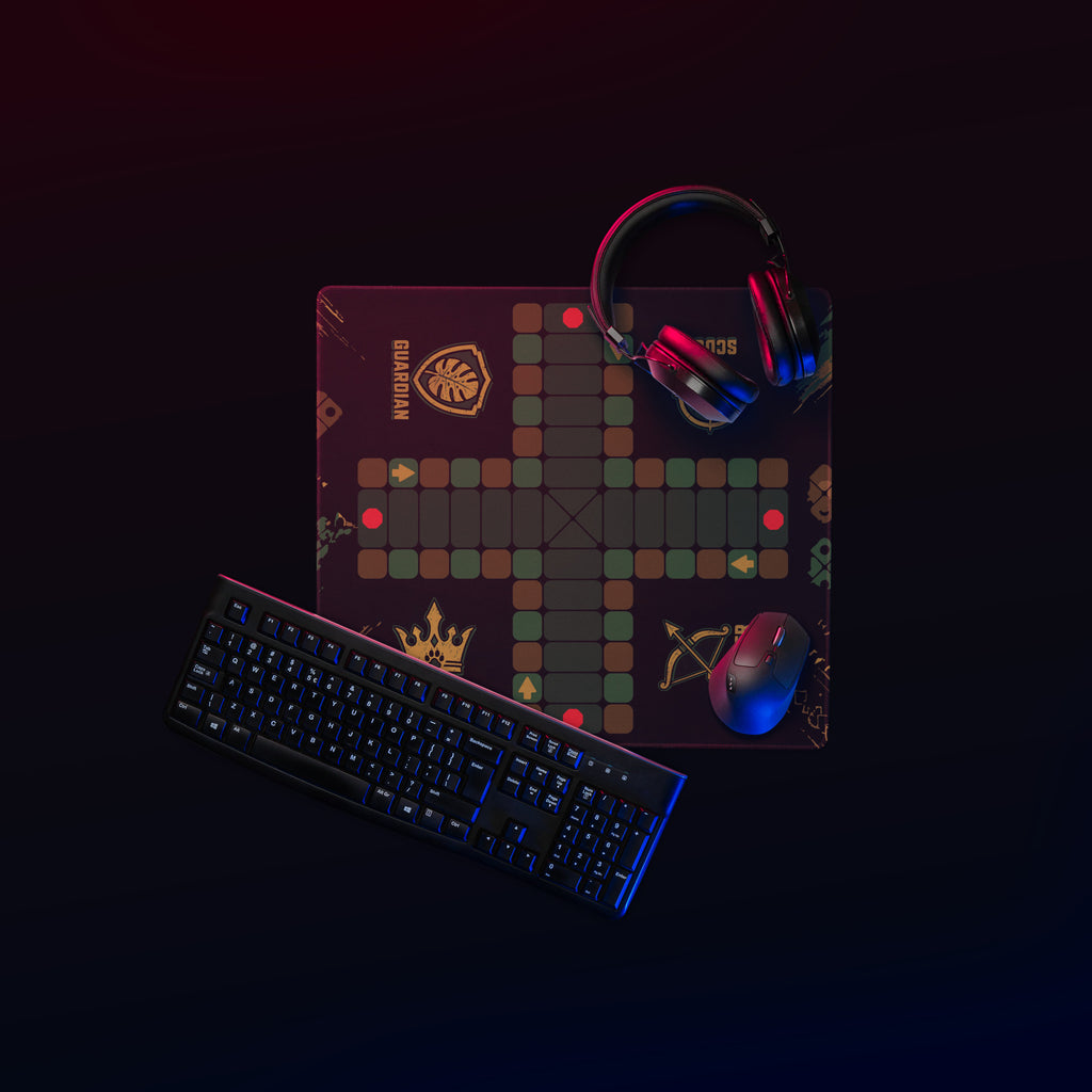 Top-down view of the compact 18 × 16-inch Jungle Roles Jamaican Ludi mouse pad with a gaming keyboard, mouse, and headphones.