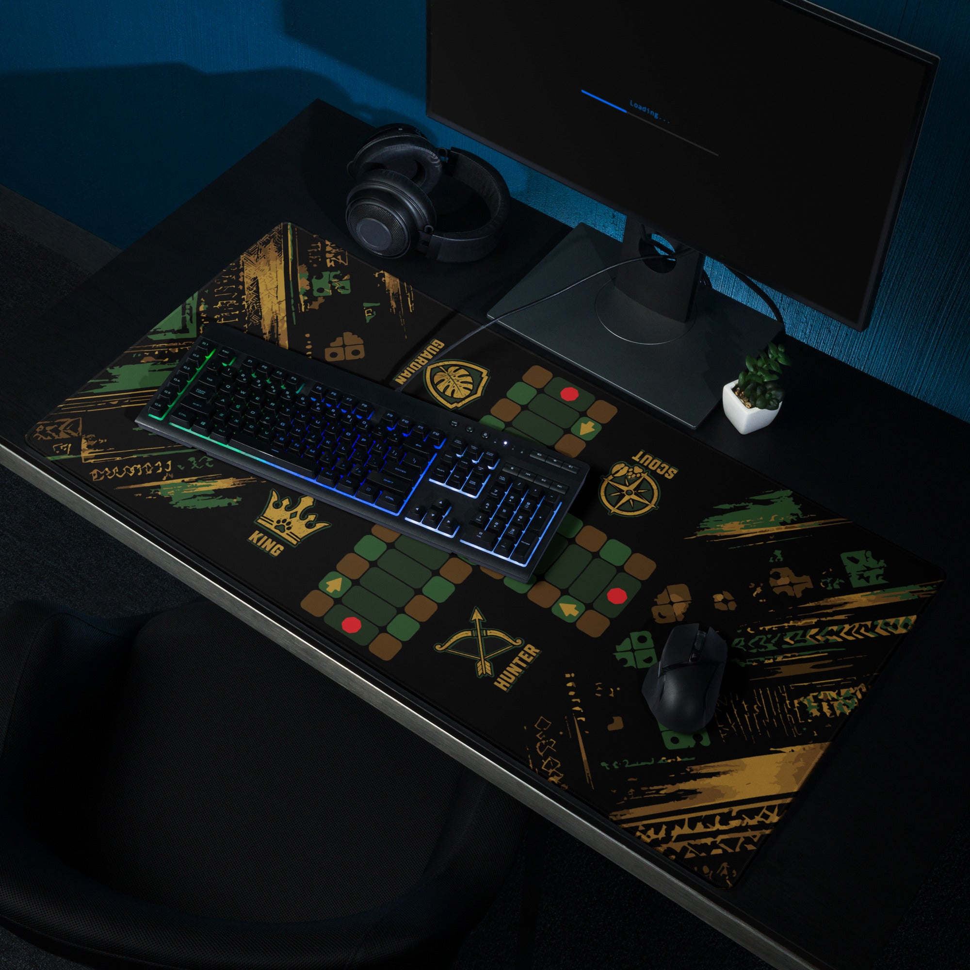36 × 18-inch Jungle Roles Jamaican Ludi mouse pad beneath a keyboard and mouse in a dark gaming station with headphones and a monitor.
Set the focal point on the center of the Ludi path beneath the keyboard.