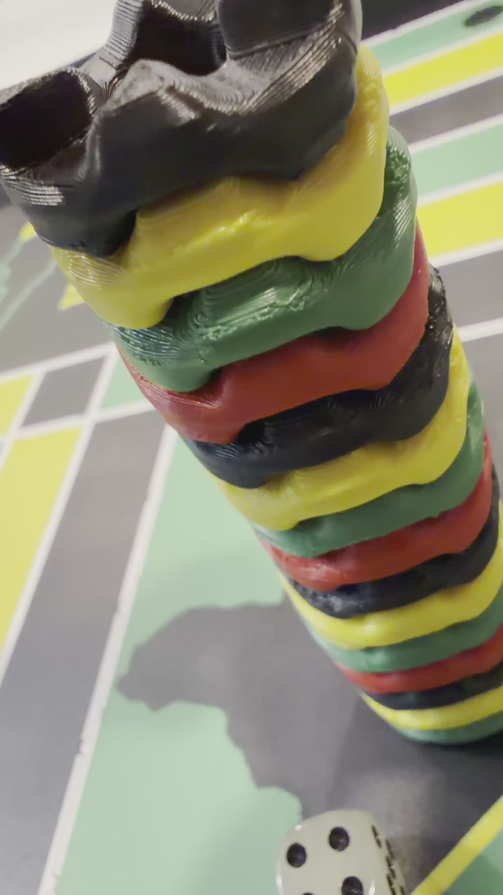 Video showcasing the 24-inch non-magnetic Lock Pon Stop Jamaican Ludi board with stackable game pieces and dice.